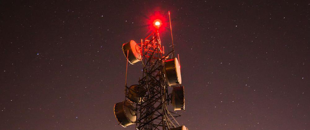 A radio tower at night