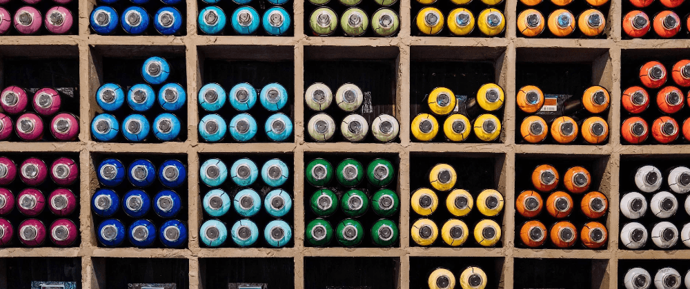 Bottles of paint grouped by colour
